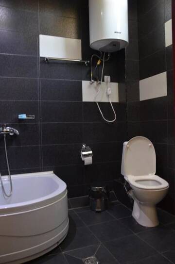 Фото номера Стандартный одноместный номер с душем Отель Hotel Kourosh г. Тбилиси 12