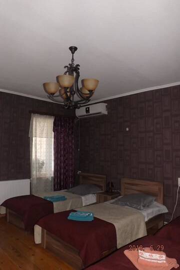 Фото номера Семейный номер с видом на сад Гостевой дом Guest House Gio г. Тбилиси 9