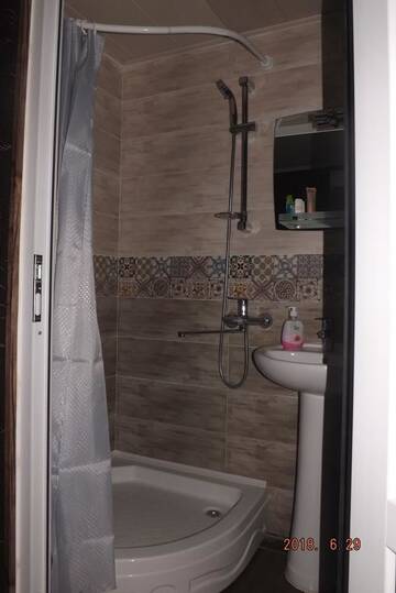 Фото номера Семейный номер с видом на сад Гостевой дом Guest House Gio г. Тбилиси 14