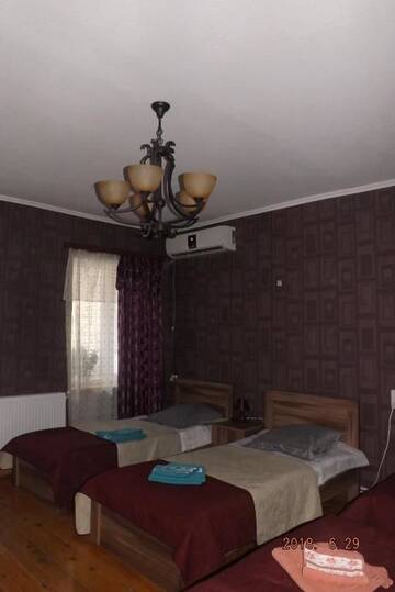Фото номера Семейный номер с видом на сад Гостевой дом Guest House Gio г. Тбилиси 19