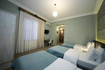 Фото номера Трехместный номер Отель Stay Boutique Hotel г. Тбилиси 7
