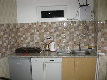 Фото номера Трехместный номер с собственной ванной комнатой Гостевой дом Apartment David г. Тбилиси 7