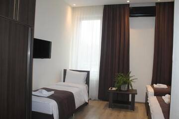 Фото номера Семейный номер Делюкс Отель GSG Hotel г. Тбилиси 8