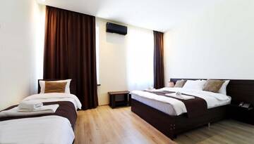 Фото номера Стандартный трехместный номер Отель GSG Hotel г. Тбилиси 3