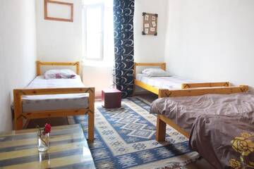 Фото номера Четырехместный номер с видом на горы Хостелы Sheni Hostel г. Тбилиси 7