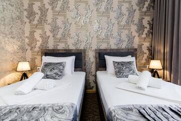 Фото номера Двухместный номер с 2 отдельными кроватями Отель Hotel Makona г. Тбилиси 10