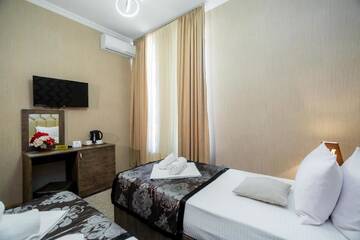 Фото номера Двухместный номер с 2 отдельными кроватями Отель Hotel Makona г. Тбилиси 16