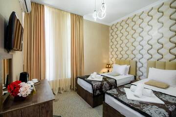 Фото номера Двухместный номер с 2 отдельными кроватями Отель Hotel Makona г. Тбилиси 18