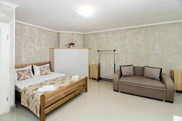 Фото номера Четырехместный номер &quot;Комфорт&quot; Гостевой дом Holiday House г. Тбилиси 10