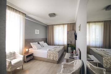Фото номера Стандартный двухместный номер с 2 отдельными кроватями Отель Hotel Kenari г. Тбилиси 3