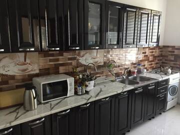 Фото номера Четырехместный номер с общей ванной комнатой Хостелы Ortachala Summer House г. Тбилиси 5