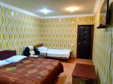 Фото номера Четырехместный номер с ванной Отель Hotel Texas г. Тбилиси 3