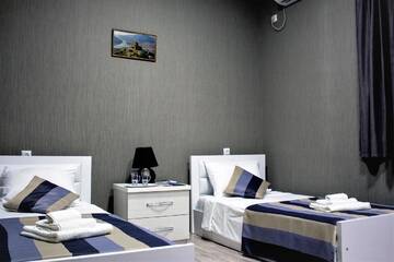 Фото номера Стандартный двухместный номер с 2 отдельными кроватями Отель Twins Hotel г. Тбилиси 2