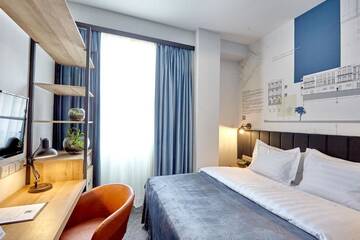 Фото номера Двухместный номер эконом-класса с 1 кроватью Отель Graphica Tbilisi Hotel г. Тбилиси 5