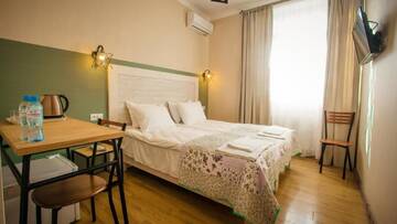 Фото номера Стандартный двухместный номер с 1 кроватью Отель Wine Symphony Boutique Hotel г. Тбилиси 6