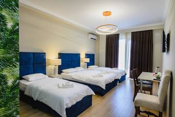 Фото номера Семейный люкс Отель Golden Globe Boutique Hotel г. Тбилиси 2