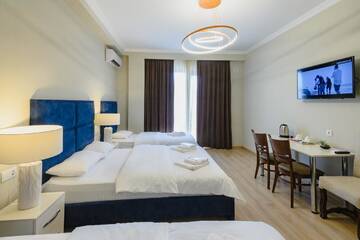 Фото номера Семейный люкс Отель Golden Globe Boutique Hotel г. Тбилиси 4