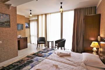 Фото номера Стандартный двухместный номер с 2 отдельными кроватями Отель Hotel Liberty Theatre г. Тбилиси 14