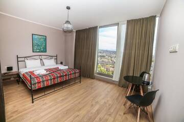 Фото номера Двухместный номер с 1 кроватью и видом на город Отель Hotel Flower г. Тбилиси 2
