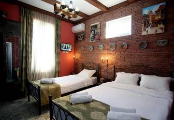 Фото номера Трехместный номер Делюкс Отель Marani Boutique Hotel г. Тбилиси 3