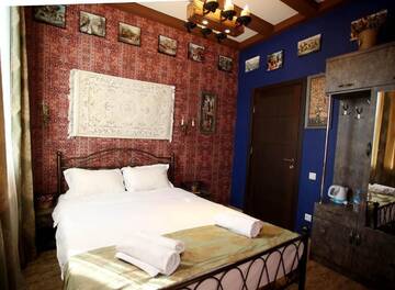 Фото номера Двухместный номер Делюкс с 1 кроватью Отель Marani Boutique Hotel г. Тбилиси 9