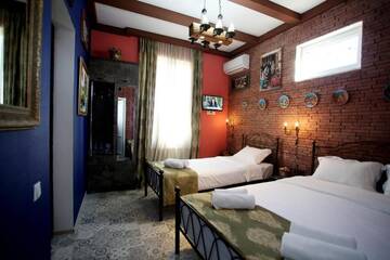 Фото номера Двухместный номер Делюкс с 1 кроватью Отель Marani Boutique Hotel г. Тбилиси 15