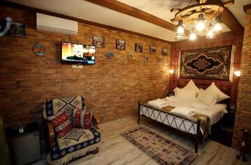 Фото номера Семейный номер Отель Marani Boutique Hotel г. Тбилиси 3