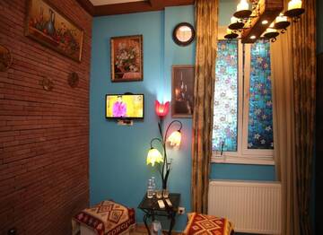 Фото номера Двухместный номер Делюкс с 1 кроватью Отель Marani Boutique Hotel г. Тбилиси 3