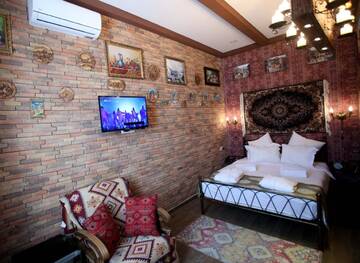 Фото номера Семейный номер Делюкс Отель Marani Boutique Hotel г. Тбилиси 5