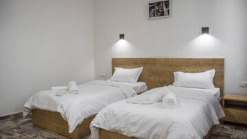Фото номера Двухместный номер с 2 отдельными кроватями Отель WESTAY Hotel г. Тбилиси 4