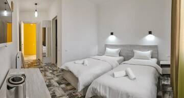 Фото номера Двухместный номер с 2 отдельными кроватями Отель WESTAY Hotel г. Тбилиси 8