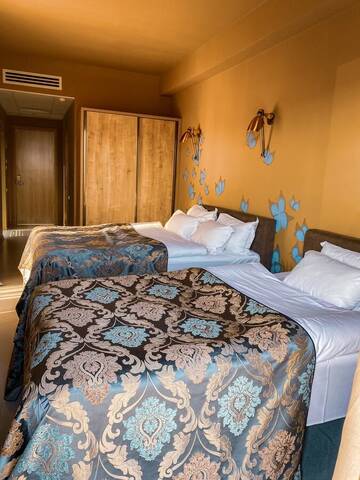 Фото номера Трехместный номер с террасой Отель Brim Hotel г. Тбилиси 3
