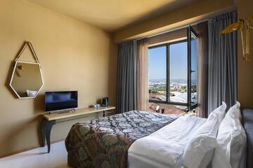 Фото номера Двухместный номер с 1 кроватью Отель Brim Hotel г. Тбилиси 3