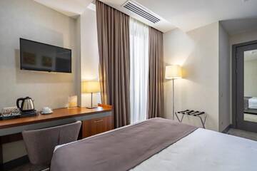 Фото номера Номер с кроватью размера «queen-size» Отель Hotel Atlas Abashidze г. Тбилиси 5