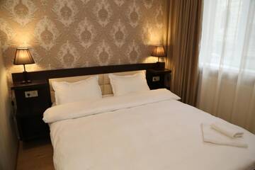 Фото номера Стандартный двухместный номер с 1 кроватью Отель Otiums Hotel г. Тбилиси 9