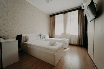 Фото номера Стандартный двухместный номер с 2 отдельными кроватями Отель Otiums Hotel г. Тбилиси 3