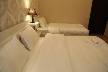 Фото номера Трехместный номер с видом на город Отель Otiums Hotel г. Тбилиси 8