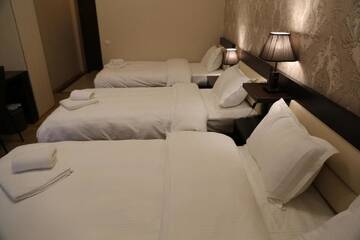 Фото номера Стандартный семейный номер Отель Otiums Hotel г. Тбилиси 7