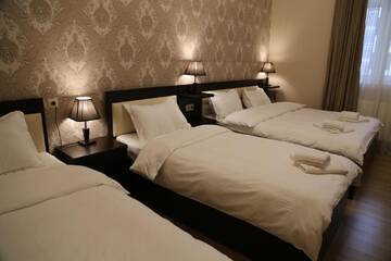 Фото номера Стандартный семейный номер Отель Otiums Hotel г. Тбилиси 8