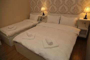 Фото номера Стандартный семейный номер Отель Otiums Hotel г. Тбилиси 5