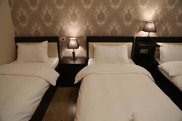 Фото номера Стандартный семейный номер Отель Otiums Hotel г. Тбилиси 6