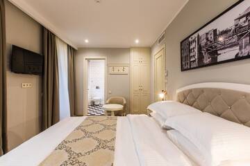 Фото номера Улучшенный двухместный номер с 1 кроватью Отель Boutique Hotel Khokhobi Old Tbilisi г. Тбилиси 4