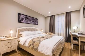 Фото номера Стандартный двухместный номер с 1 кроватью Отель Boutique Hotel Khokhobi Old Tbilisi г. Тбилиси 4