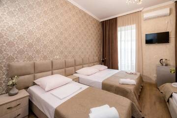 Фото номера Семейный номер Делюкс (5 взрослых) Гостевой дом Star Hotel г. Тбилиси 16