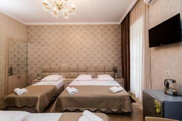 Фото номера Семейный номер Делюкс (5 взрослых) Гостевой дом Star Hotel г. Тбилиси 14