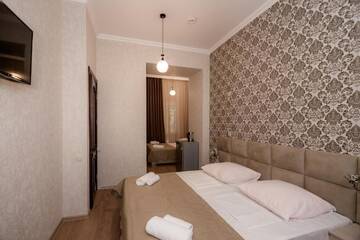 Фото номера Семейный номер Делюкс Гостевой дом Star Hotel г. Тбилиси 2