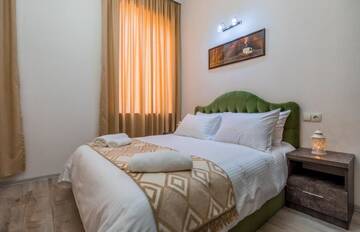 Фото номера Большой двухместный номер с 1 кроватью Отель Golden Light Hotel г. Тбилиси 8