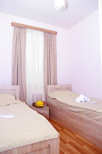 Фото номера Семейный номер с террасой Апарт-отели Apart Hotel 25 г. Тбилиси 32