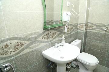 Фото номера Просторный двухместный номер с 2 отдельными кроватями Апарт-отели Апартаменты "Город на ладони" г. Тбилиси 10