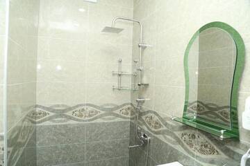 Фото номера Просторный двухместный номер с 2 отдельными кроватями Апарт-отели Апартаменты "Город на ладони" г. Тбилиси 16